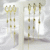 Trio de Argolas com Bolas Pendentes Folheado a Ouro - comprar online
