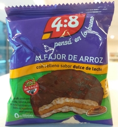 Alfajor arroz 4:8 bañado en chocolate negro relleno dulce de leche und x 24 gr.