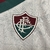 Camisa Fluminense III 24/25 Torcedor Umbro Masculina na cor bege, com detalhes em verde e bordô, destacando o logo do clube e a marca Umbro. camisa-camisas-blusa-blusas-uniforme-fluminense-iii-3-terceira-terceiro-24-25-torcedor-umbro-masculina-masculino-b