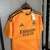 Camisa de goleiro do Real Madrid, cor laranja, com detalhes em preto e logo da Adidas. camisa-camisas-blusa-blusas-uniforme-real-madrid-ii-2-segunda-segundo-24-25-torcedor-adidas-masculina-masculino-laranja-vini-jr-mbappe-bellingham