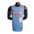 Regata Basquete NBA  Chicago Bulls  na cor predominante Azul com a logo do Bulls na parte frontal  da regata, logotipo da Nike no lado direito do peito, gola careca com detalhes em vermelho e branco, nomes e números na cor branca, a logotipo da NBA na par