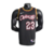 Regata Basquete Cleveland Cavaliers  Preta, gola careca com detalhes em amarelo, logo da Nike em branco no lado direito da regata, estampas frente e costas em branco com bordas de Vermelho logotipo da NBA na parte da nuca.