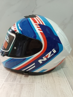 CASCO NZI TRENDY BLANCO CELESTE AZUL ROJO + VISOR DE REPUESTO M