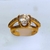 ANEL COM PEDRA 6MM DE ZIRCÔNIA E CRAVEJADO COM MICROZIRNOIAS FOLHEADO A OURO 18K