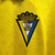 camisa-camisas-camisetas-manto-mantos-blusa-blusas-uniformes-tailandesas-original-ca-cadiz-primeira-titular-casa-fan-marca-macron-2024-2025-torcedor-torcedores-masculina-amarela-7.webp