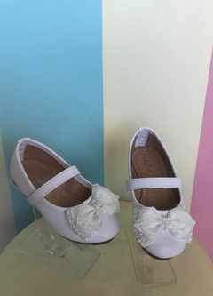 Zapato cabra blanco con moño glitter