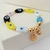 XB4256230 PULSERA ELÁSTICA OJITOS - comprar en línea