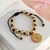 XB4367190PULSERA AJUSTABLE VIRGEN