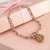 XB4370150 PULSERA ESLABONES CON CARITA