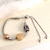 XB4384290 PULSERA CON DIJES