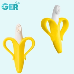 Imagen de Chupón Fruta Alimentador Push con Sonaja + Cepillo Dental Pediátrico en forma de Banana