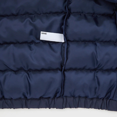 CAMPERA PUFFER UNIQLO CELESTE en internet