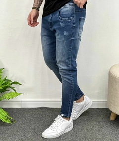 Calça Jeans Skinny com puidos