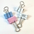 BINDER CLIP - AZUL E ROSA - comprar online