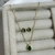 Conjunto Gota Verde Cravejado Banhado a Ouro 18k na internet