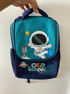 BOLSA TÉRMICA INFANTIL DE ASTRONAUTA VERMELHO/AZUL/VERDE na internet