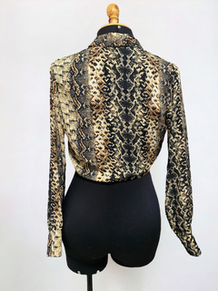 Blusa animal print Papu na internet