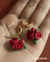 aretes rosas