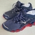 Mizuno Prophecy 9 - Azul/Vermelho - About Cloths