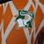 Camisa Costa do Marfim Pré-Jogo 23/24 - Jogador Puma Masculina - Laranja com detalhes em branco e verde - loja online