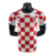 camisa-home-croacia-masculina-vermelho-branco-2022-2023-nike-futebol