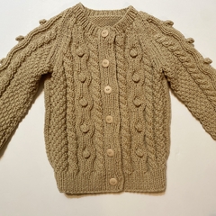 Sweater beige pompones