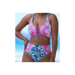 Bikini colaless tiro alto corpiño breteles anchos  y escote con tiras cruzadas. Lycra estampada reversible.