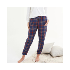 Pantalón pijama de mujer a cuadrillé azul con líneas rojas, elástico en cintura y botamanga.
Pantalon de mujer a cuadrillé.