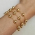 Pulseira Com Esferas Banhada a Ouro 18k