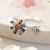 AN 414 - Anillo flor cubics colores (PLATA LAMINADA)