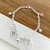 PU 391 - PULSERA ESTRELLAS CALADAS (ACERO BLANCO) - comprar online