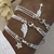 PU 433 - 434 -435 - PULSERA TRIPLE CADENA DIJE CUBICS (ACERO BLANCO)