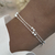 PU 446 - PULSERA DOBLE CON BOLITAS (ACERO BLANCO)