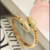 Bracelete Serpente Cravejada com Zircônias e Pedras de Esmeralda no banho de Ouro 18k - comprar online