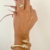 Bracelete Serpente Cravejada com Zircônias e Pedras de Esmeralda no banho de Ouro 18k - Ana Elise Joias l Semijoias e Acessórios