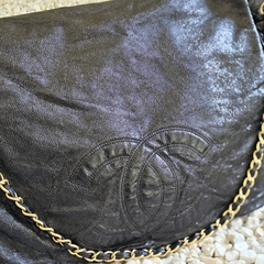 Chanel CC Rock and Chain Flap na internet