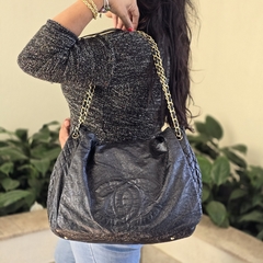 Chanel CC Rock and Chain Flap na internet