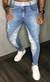 CALÇA JEANS RECORTE JOELHO LAVAGEM MÉDIA - CODI - comprar online