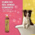 Frasco de shampoo clareador tonalizante Ametista Cereja e Avelã da Dolce Pet, com um cachorro em uma banheira ao fundo.