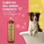 Frasco de shampoo Suave Esmeralda Bambu Mossô da Dolce Pet com um cachorro em uma banheira.