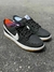 Nike Dunk Low - Preto com Detalhe Branco na internet