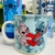 Caneca Tom Stitch e Angel 350ml na internet