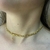 Colar estilo choker, design de corrente de fios trançados, banhado no ouro.