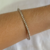 Bracelete Torcido com Design Fino Banhado a Ródio Branco - comprar online