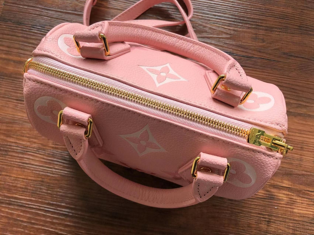 louis vuitton bookbag pink