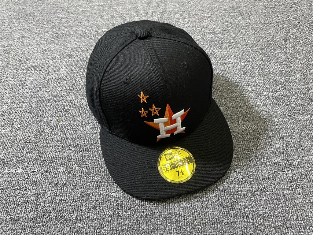 Take a look at Travis Scott's limited edition Astros hats