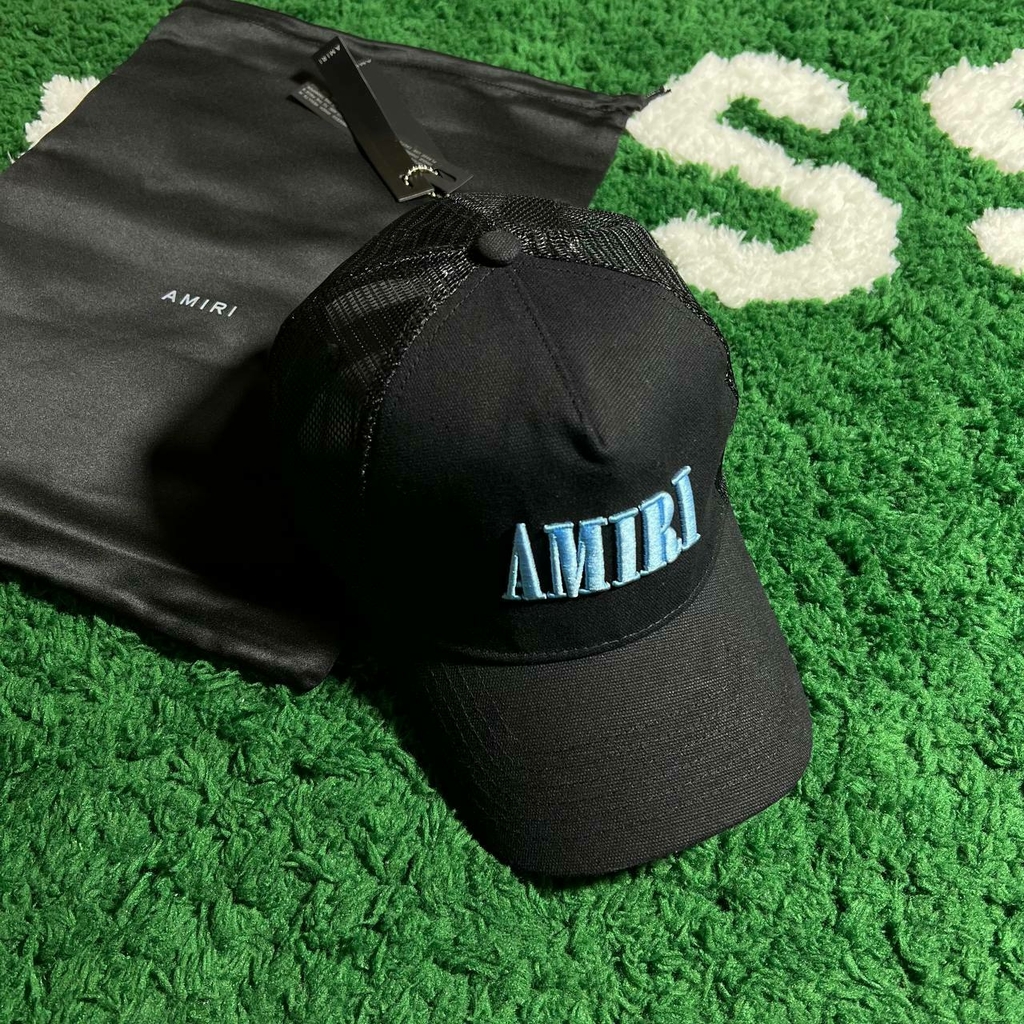 Elevating Style: Amiri Core Logo Trucker Hat Black-Blue