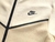 detail-ziper-pants-nike-tech-fleece-beach-brown