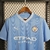 camisa-manchester-city-1-i-titular-home-casa-mandante-23-24-2023-2024-masculina-azul-celeste-puma-torcedor-fan-etihad-stadium-citizens-man-sky-blues-manto-oficial-original-official-authentic-netshoes-futfanatics-centauro-tailandesa-replica