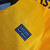 camisa-wolverhampton-wolves-1-i-home-titular-casa-mandante-23-24-2023-2024-masculina-laranja-castore-torcedor